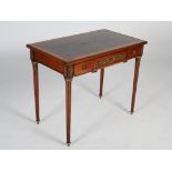 A late 19th century French mahogany and gilt metal mounted writing table, the rectangular top with