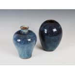 Two Chinese purple and blue glazed vases, Qing Dynasty, one oviform shaped, bearing four character