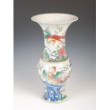 A Chinese porcelain famille rose yen yen vase, late 19th/ early 20th century, decorated with long