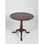 A George III mahogany bird cage snap top occasional table, the hinged top with a piecrust edge,