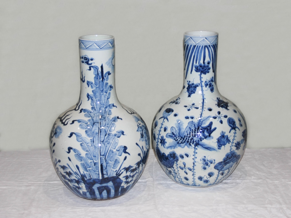 A pair of decorative Chinese blue and white porcelain bottle vases, decorated in the Ming style with - Image 4 of 13