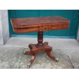 A 19th century mahogany and ebony lined pedestal card table, the rounded rectangular