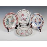 Four assorted Chinese porcelain plates, Qing Dynasty, comprising; a pair of famille rose plates