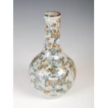 A Chinese porcelain crackle glazed bottle vase, Qing Dynasty, decorated with a bottle vase issuing
