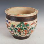 A Chinese porcelain crackle glazed fish bowl/ jardiniere, Qing Dynasty, decorated in famille verte
