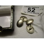 Pair of silver cufflinks