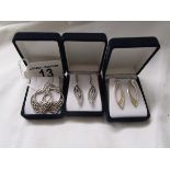 3 pairs of silver earrings