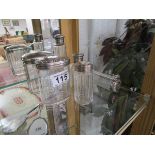 6 silver topped scent and powder bottles