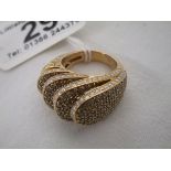 Unusual 18ct pink gold ring set with many diamonds