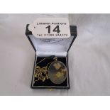 Antique gold cased glass locket on gold chain