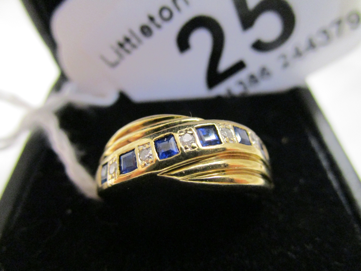 Gold diamond & sapphire half hoop ring