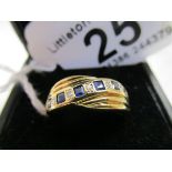 Gold diamond & sapphire half hoop ring