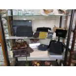 2 shelves of ladies handbags, gloves etc