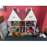 Large dolls house with furniture