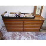 Pair of teak chests of 4 drawers by Austin Suite