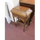 Edwardian carved oak needlework table