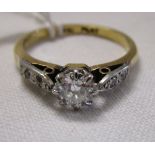 18ct diamond solitaire ring (approx .5 ct) with diamond shoulders