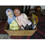 Wicker basket and contents to include vintage dolls