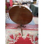 Early mahogany tilt top table