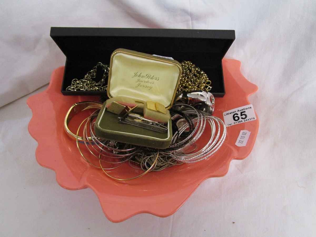 Collection of costume jewellery in pink bowl