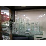 Collection of old glass chemist bottles