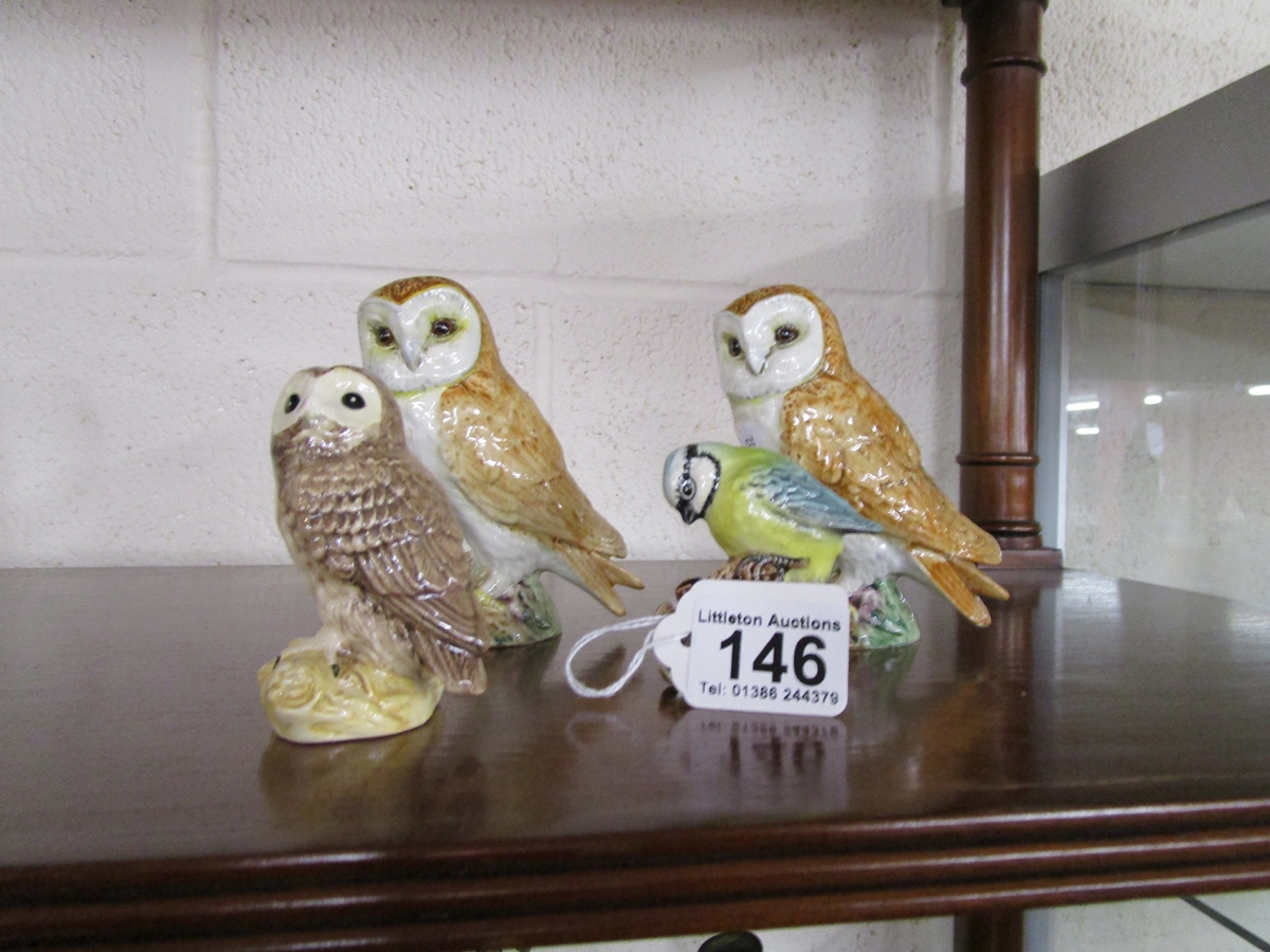 3 Beswick owls and a Blue Tit