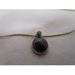 Gold double sapphire pendant on gold chain