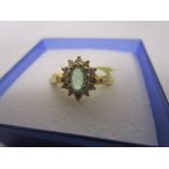 18ct gold emerald and diamond ring