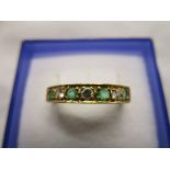18ct gold emerald & diamond half eternity ring