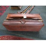 Vintage leather doctors bag and instruments