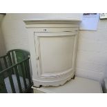 Painted bow front corner cabinet
