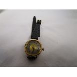 Gold ladies watch with leather bracelet