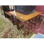 Fold over teak nest of 3 tables