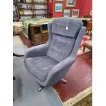 Retro revolving upholstered armchair