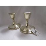 Small pair of hallmarked silver candlesticks