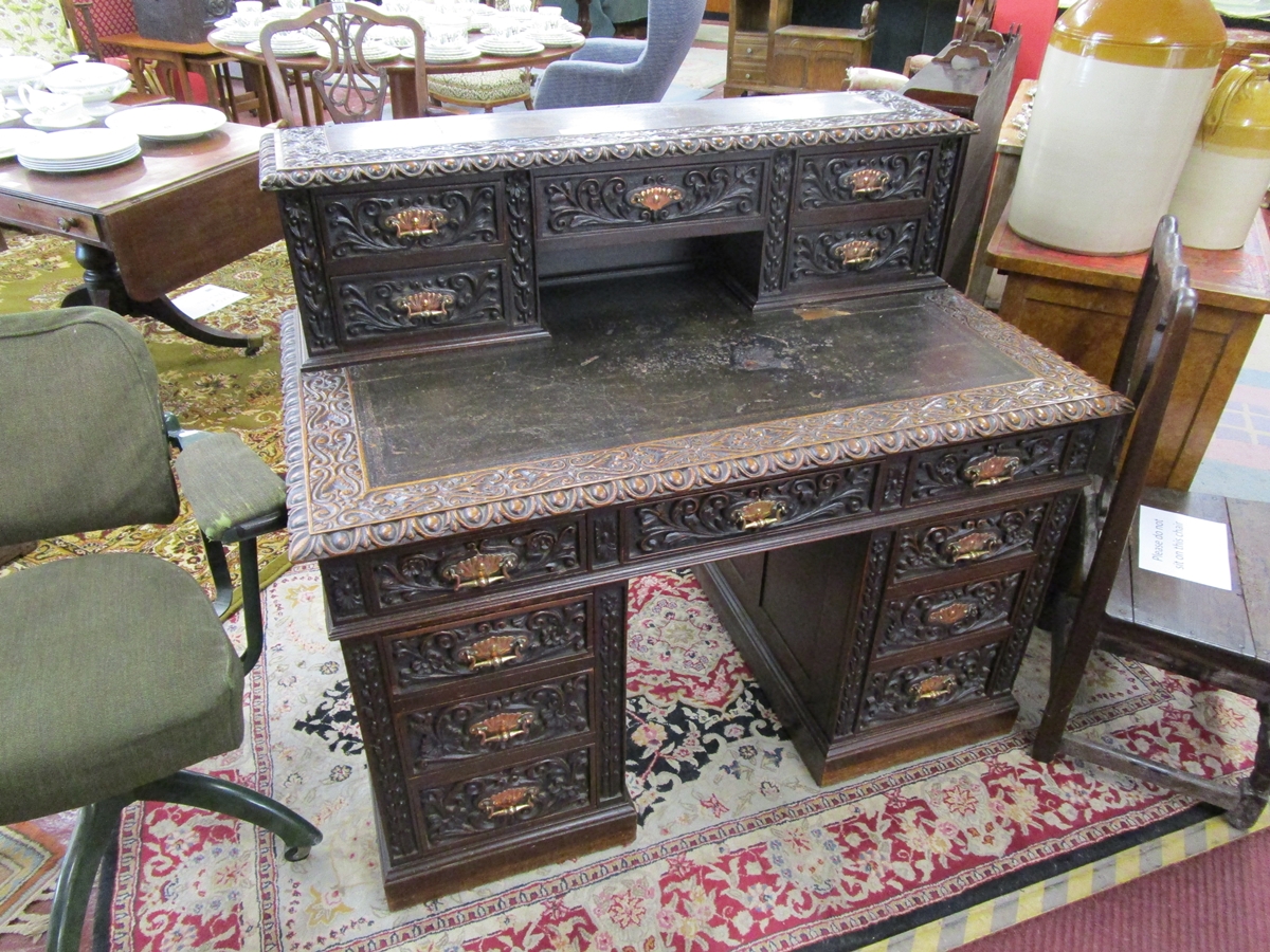 Early oak carved pedestal desk