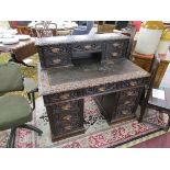 Early oak carved pedestal desk