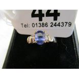 Gold tanzanite & baguette diamond ring