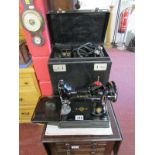 Small electric Singer sewing machine with case & accessories