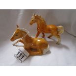 Beswick horse lay down and another
