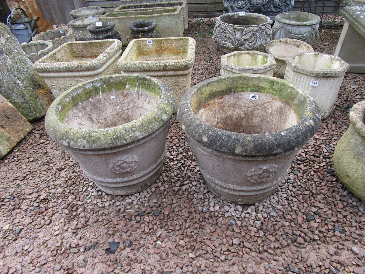 Pair of large circular stone pots