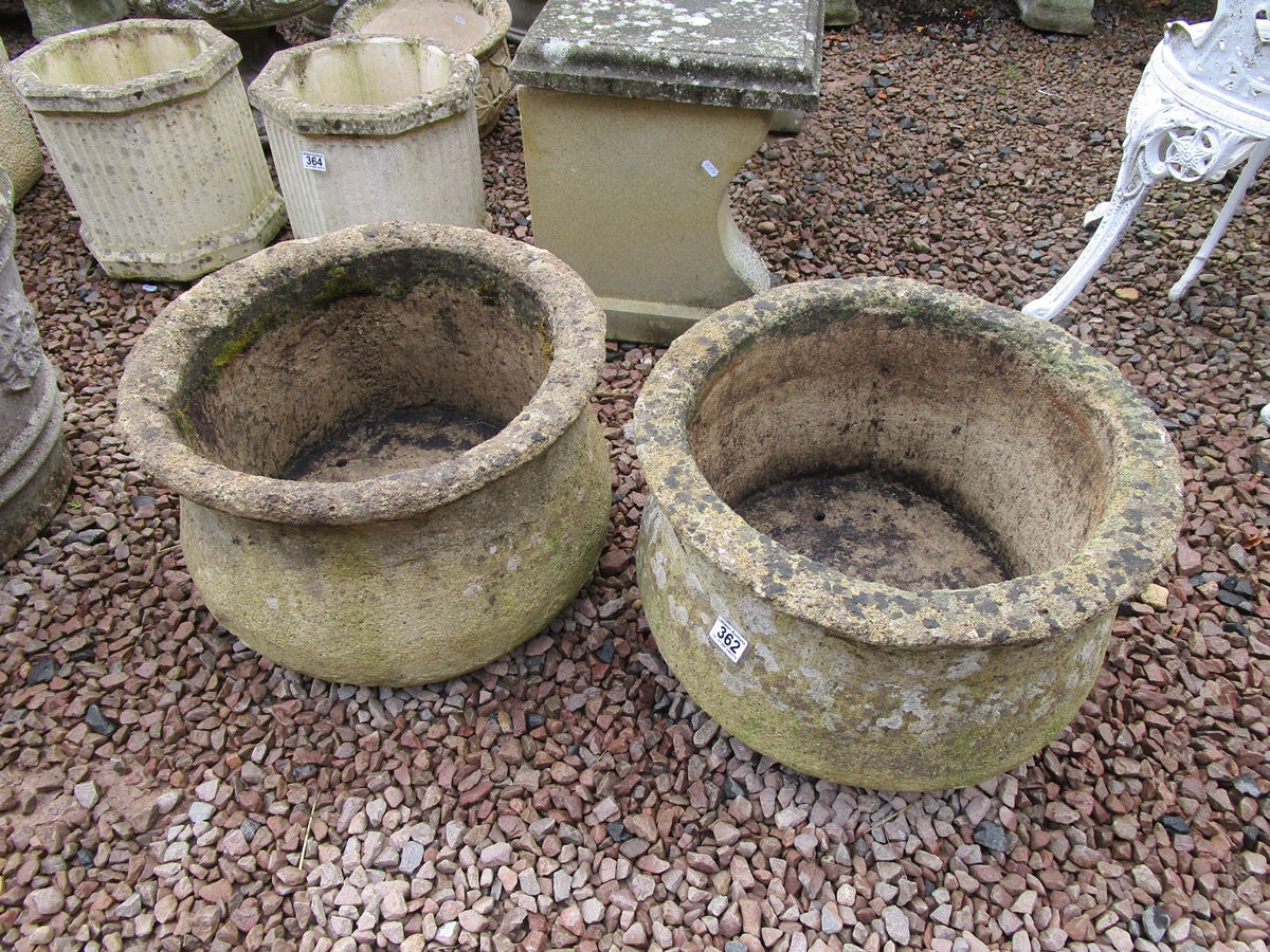 Pair of large circular stone pots