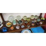Shelf of paperweights