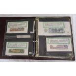 Folder of mint bank notes