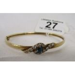 Gold stone set bangle