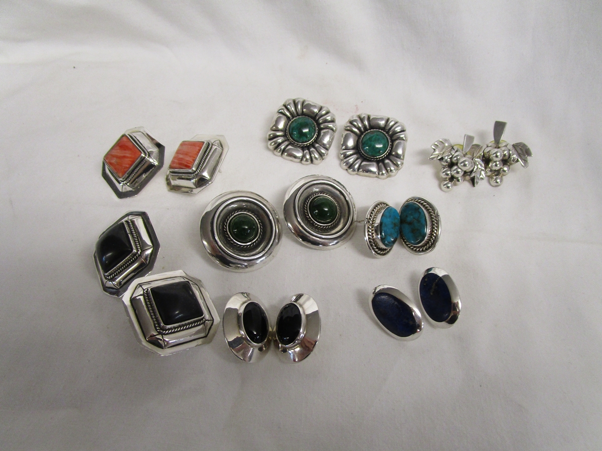 Collection of 8 pairs of sterling silver earrings after Peruvian Connection