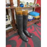 Pair of antique leather riding boots with treen trees