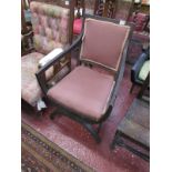 Antique crossover armchair