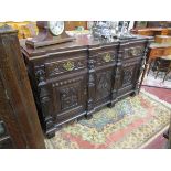 Carved oak sideboard