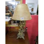 Brass cherub figure table lamp